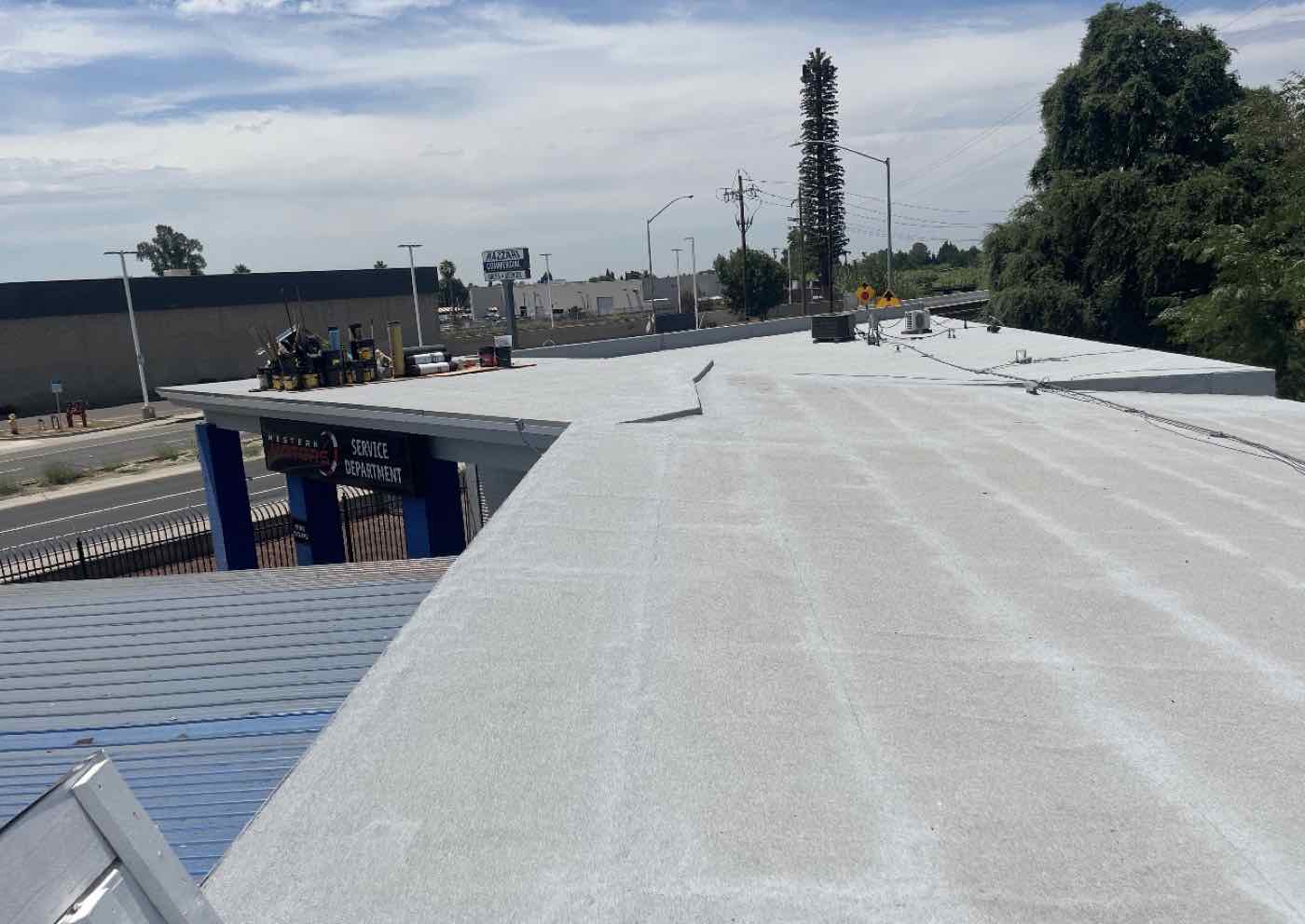 Completed commercial flat roof with new coating, Merced, CA